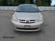 2006 Toyota Sienna XLE z VIN 5TDBA22C06S075554, wystawiony jako Copart lot #69133605 z przebiegiem 188 185 mil mil oraz Szkoda całkowita • Salvage title. Historia ofert i sprzedaży dostępna na DreamBid. Obrazek 5.