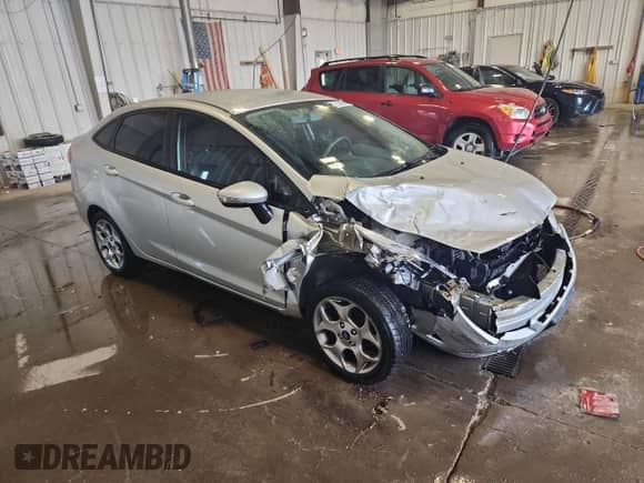 2012 Ford Fiesta SEL with VIN 3FADP4CJ6CM159394, listed as a Copart auction lot 81342065 with 94,550 mi miles and Non repairable. Bid and sale history available at DreamBid. Image 4.