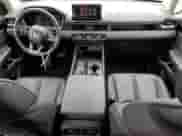 2025 Honda Pilot EX-L z VIN 5FNYG2H45SB024798, wystawiony jako Copart lot #67870725 z przebiegiem 5 927 mil mil oraz Szkoda całkowita • Salvage title. Historia ofert i sprzedaży dostępna na DreamBid. Obrazek 8.