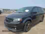 2014 Dodge Grand Caravan SXT with VIN 2C4RDGCG1ER463209, listed as a IAAI auction lot 42403781 with 79,387 mi miles and . Bid and sale history available at DreamBid. Image 2.