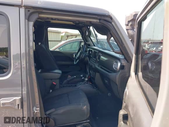 2021 Jeep Wrangler Unlimited Sahara High Altitude with VIN 1C4HJXEN8MW591985, listed as a IAAI auction lot 42892092 with 99,124 mi miles and . Bid and sale history available at DreamBid. Image 5.