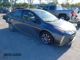 2021 Toyota Prius LE with VIN JTDL9MFU6M3026191, listed as a IAAI auction lot 41962542 with 164,558 mi miles and . Bid and sale history available at DreamBid. Image 1.