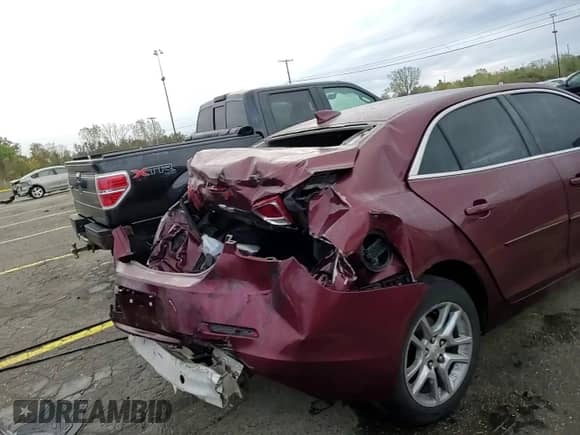 2015 Chevrolet Malibu LT z VIN 1G11C5SL4FF354781, wystawiony jako Copart lot #85502975 z przebiegiem 120 426 mil mil oraz Czysty tytuł • Clean title. Historia ofert i sprzedaży dostępna na DreamBid. Obrazek 13.