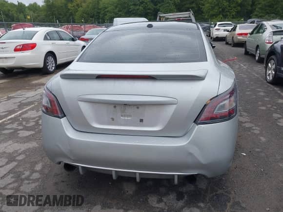 2014 Nissan Maxima S z VIN 1N4AA5AP3EC495087, wystawiony jako IAAI lot #43122516 z przebiegiem 122 886 mil mil oraz . Historia ofert i sprzedaży dostępna na DreamBid. Obrazek 19.