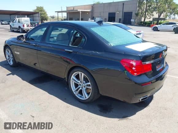 2011 BMW 7 Series 750Li with VIN WBAKB8C5XBCY64531, listed as a IAAI auction lot 42350009 with 113,893 mi miles and . Bid and sale history available at DreamBid. Image 3.