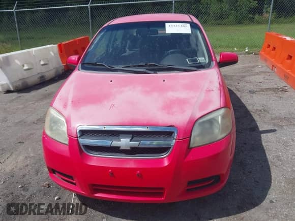 2007 Chevrolet Aveo LS with VIN KL1TD56697B189103, listed as a IAAI auction lot 43325381 with 145,543 mi miles and . Bid and sale history available at DreamBid. Image 6.