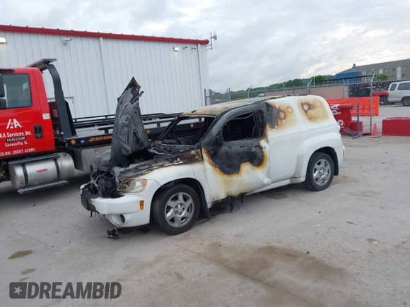 2009 Chevrolet HHR LS with VIN 3GCCA85B79S606453, listed as a IAAI auction lot 42624404 with Not provided miles and . Bid and sale history available at DreamBid. Image 2.