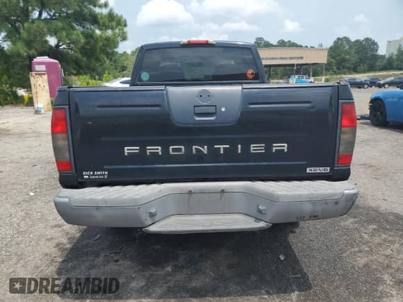 2003 Nissan Frontier XE with VIN 1N6ED29X03C466209, listed as a Copart auction lot 63758945 with 211,744 mi miles and Salvage title. Bid and sale history available at DreamBid. Image 6.
