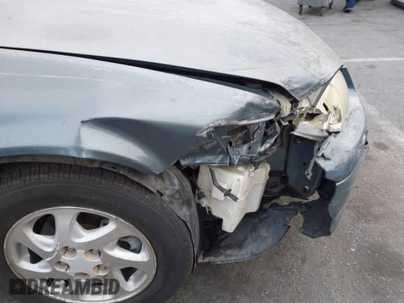 2000 Toyota Camry LE z VIN JT2BG22K6Y0495744, wystawiony jako IAAI lot #43118418 z przebiegiem 237 471 mil mil oraz . Historia ofert i sprzedaży dostępna na DreamBid. Obrazek 17.