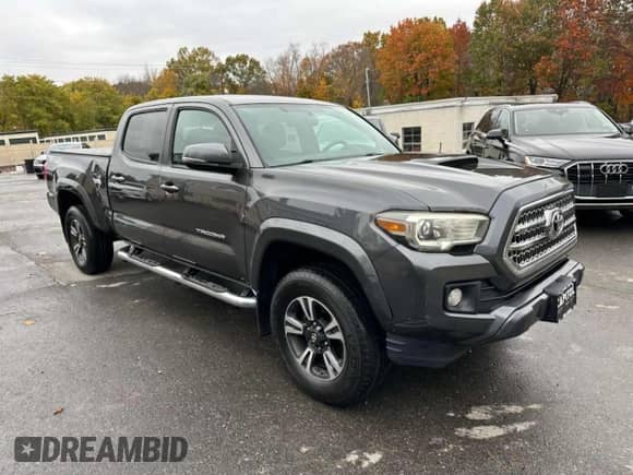 2017 Toyota Tacoma TRD Off Road z VIN 3TMDZ5BNXHM023386, wystawiony jako Copart lot #90888765 z przebiegiem 193 045 mil mil oraz Czysty tytuł • Clean title. Historia ofert i sprzedaży dostępna na DreamBid. Obrazek 4.