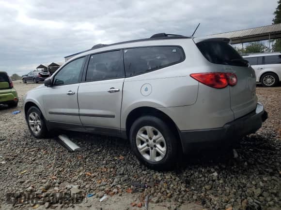 2012 Chevrolet Traverse LS with VIN 1GNKRFED7CJ208864, listed as a Copart auction lot 83832215 with 176,623 mi miles and Salvage title. Bid and sale history available at DreamBid. Image 2.