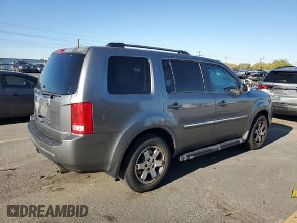 2009 Honda Pilot Touring with VIN 5FNYF38809B003718, listed as a Copart auction lot 82214735 with 163,001 mi miles and Clean title. Bid and sale history available at DreamBid. Image 3.