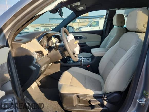 2023 Chevrolet Traverse LS with VIN 1GNERFKW9PJ119791, listed as a Copart auction lot 70497505 with 24,411 mi miles and Salvage title. Bid and sale history available at DreamBid. Image 7.