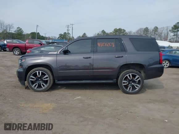 2018 Chevrolet Tahoe Premier с VIN 1GNSKCKJ7JR288243, выставлен на аукционе IAAI как лот 41701208 с пробегом 121 712 миль миль и . История ставок и продаж доступна на DreamBid. Изображение 14.