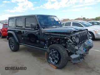 2022 Jeep Wrangler Unlimited Rubicon с VIN 1C4JJXR64NW256714, выставлен на аукционе IAAI как лот 42769010 с пробегом 35 291 миль миль и . История ставок и продаж доступна на DreamBid. Изображение 1.