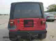 1998 Jeep Wrangler Sport z VIN 1J4FY19S2WP735215, wystawiony jako Copart lot #81622595 z przebiegiem 139 976 mil mil oraz Szkoda całkowita • Salvage title. Historia ofert i sprzedaży dostępna na DreamBid. Obrazek 6.