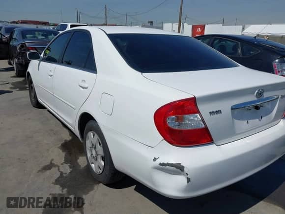 2002 Toyota Camry LE с VIN JTDBE32K720020808, выставлен на аукционе IAAI как лот 41849196 с пробегом 150 546 миль миль и . История ставок и продаж доступна на DreamBid. Изображение 6.