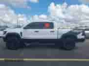 2023 Ram 1500 TRX z VIN 1C6SRFU95PN572888, wystawiony jako IAAI lot #43319141 z przebiegiem 17 078 mil mil oraz . Historia ofert i sprzedaży dostępna na DreamBid. Obrazek 14.