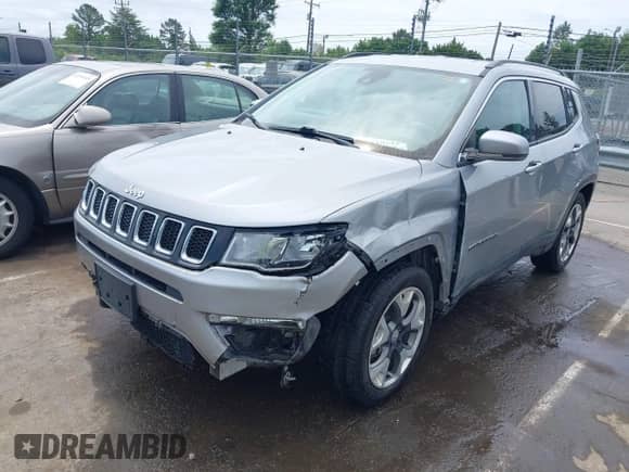 2021 Jeep Compass Limited with VIN 3C4NJCCB0MT573569, listed as a IAAI auction lot 42301154 with 106,812 mi miles and . Bid and sale history available at DreamBid. Image 2.