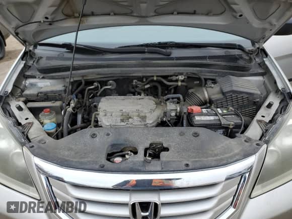 2009 Honda Odyssey z VIN 5FNRL38139B500939, wystawiony jako Copart lot #52079215 z przebiegiem 217 072 mil mil oraz Czysty tytuł • Clean title. Historia ofert i sprzedaży dostępna na DreamBid. Obrazek 12.