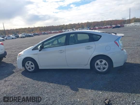 2011 Toyota Prius I z VIN JTDKN3DU5B0289422, wystawiony jako IAAI lot #43566805 z przebiegiem 316 276 mil mil oraz . Historia ofert i sprzedaży dostępna na DreamBid. Obrazek 14.