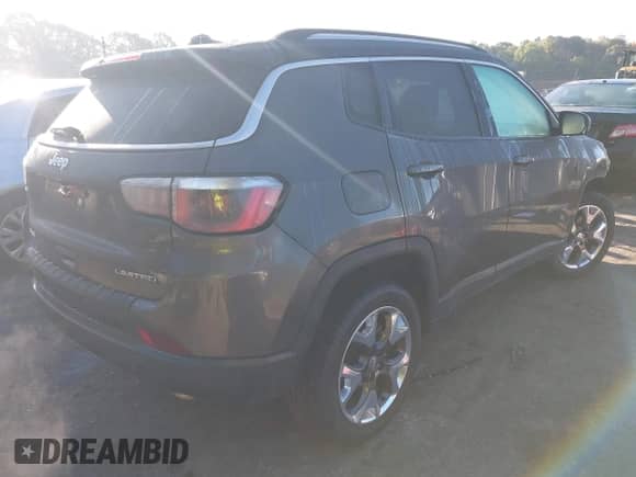 2019 Jeep Compass Limited with VIN 3C4NJDCB3KT842909, listed as a IAAI auction lot 43338860 with 100,667 mi miles and . Bid and sale history available at DreamBid. Image 4.