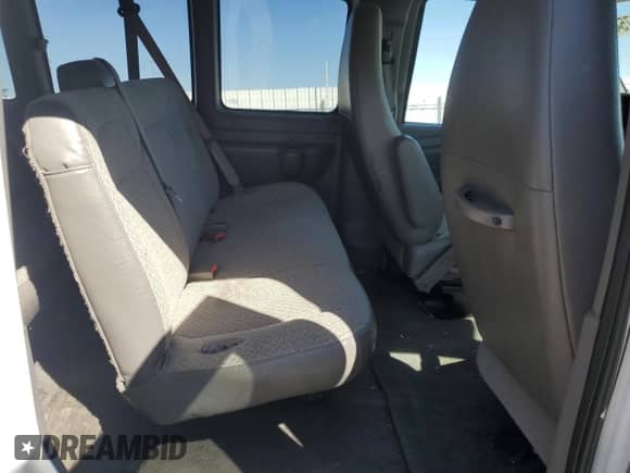 2012 Chevrolet Express Passenger 1LT с VIN 1GAZG1FG6C1186289, выставлен на аукционе Copart как лот 58240754 с пробегом 63 816 миль миль и Списание • Salvage title. История ставок и продаж доступна на DreamBid. Изображение 11.