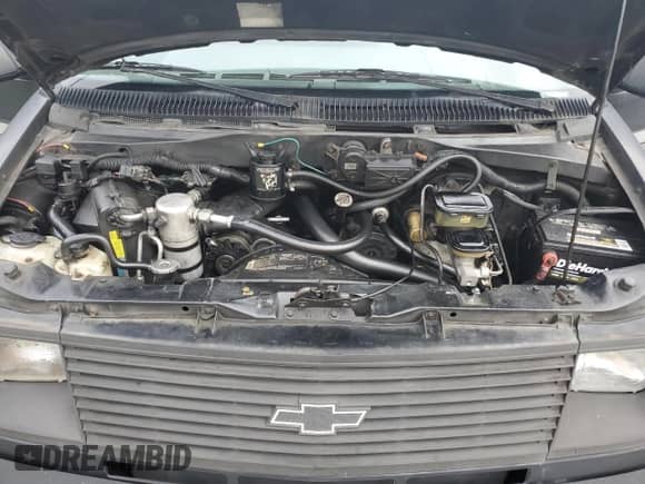 1992 Chevrolet Astro Cargo with VIN 1GBDM19Z3NB192740, listed as a Copart auction lot 69691115 with 185,801 mi miles and Salvage title. Bid and sale history available at DreamBid. Image 12.