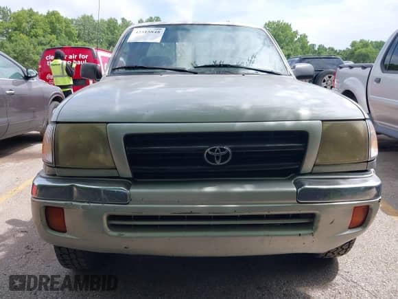 2000 Toyota Tacoma with VIN 4TAWM72N7YZ646025, listed as a IAAI auction lot 42515848 with 156,551 mi miles and . Bid and sale history available at DreamBid. Image 6.