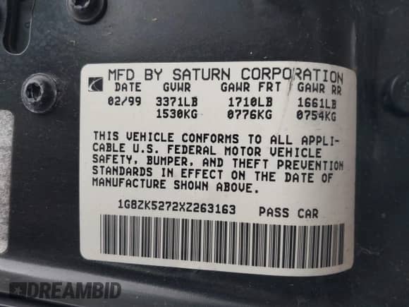 1999 Saturn SL z VIN 1G8ZK5272XZ263163, wystawiony jako IAAI lot #42180002 z przebiegiem 138 463 mil mil oraz . Historia ofert i sprzedaży dostępna na DreamBid. Obrazek 9.