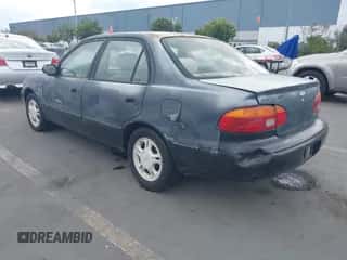 1999 Chevrolet Prizm z VIN 1Y1SK5283XZ412109, wystawiony jako IAAI lot #43342276 z przebiegiem 121 038 mil mil oraz . Historia ofert i sprzedaży dostępna na DreamBid. Obrazek 3.