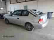 2002 Hyundai Accent GS z VIN KMHCG35C32U190168, wystawiony jako Copart lot #71414935 z przebiegiem 205 445 mil mil oraz Szkoda całkowita • Salvage title. Historia ofert i sprzedaży dostępna na DreamBid. Obrazek 2.