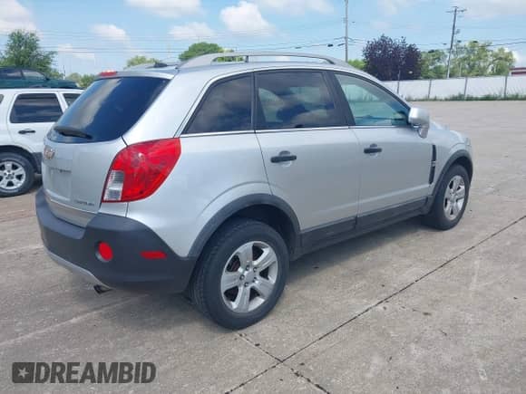 2013 Chevrolet Captiva Sport LS with VIN 3GNAL2EKXDS605487, listed as a IAAI auction lot 42639958 with 149,692 mi miles and . Bid and sale history available at DreamBid. Image 4.