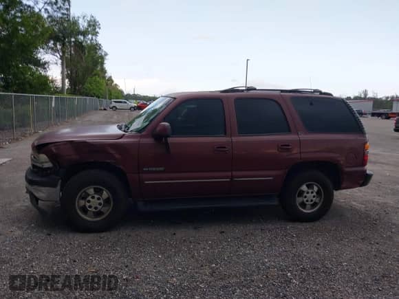 2001 Chevrolet Tahoe LS with VIN 1GNEC13TX1J205658, listed as a IAAI auction lot 42363087 with 288,059 mi miles and . Bid and sale history available at DreamBid. Image 14.