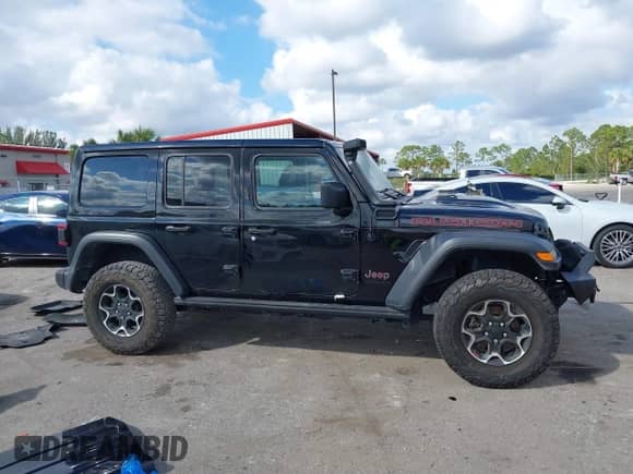 2023 Jeep Wrangler Rubicon с VIN 1C4HJXFGXPW534515, выставлен на аукционе IAAI как лот 41524419 с пробегом 21 376 миль миль и . История ставок и продаж доступна на DreamBid. Изображение 13.