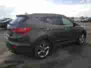 2014 Hyundai Santa Fe z VIN 5XYZUDLA6EG215861, wystawiony jako Copart lot #81632495 z przebiegiem 99 576 mil mil oraz Szkoda całkowita • Salvage title. Historia ofert i sprzedaży dostępna na DreamBid. Obrazek 3.