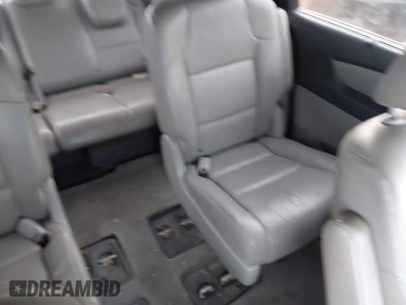 2013 Honda Odyssey EX-L с VIN 5FNRL5H66DB001116, выставлен на аукционе IAAI как лот 43389130 с пробегом 206 380 миль миль и . История ставок и продаж доступна на DreamBid. Изображение 8.