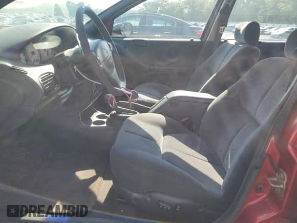2000 Dodge Stratus SE with VIN 1B3EJ46X8YN175496, listed as a Copart auction lot 70048685 with 77,959 mi miles and Salvage title. Bid and sale history available at DreamBid. Image 7.