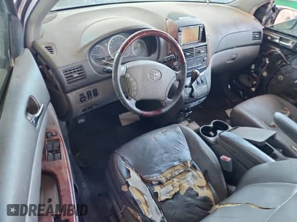 2004 Toyota Sienna XLE z VIN 5TDZA22C94S090436, wystawiony jako Copart lot #82654735 z przebiegiem 250 511 mil mil oraz Czysty tytuł • Clean title. Historia ofert i sprzedaży dostępna na DreamBid. Obrazek 8.