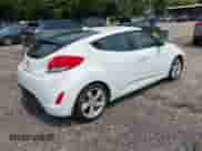 2015 Hyundai Veloster with VIN KMHTC6ADXFU232692, listed as a IAAI auction lot 42407054 with 80,745 mi miles and . Bid and sale history available at DreamBid. Image 4.