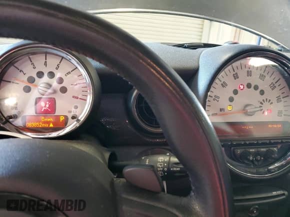 2012 MINI Hardtop S with VIN WMWSV3C51CTY16623, listed as a Copart auction lot 67827615 with 83,852 mi miles and Salvage title. Bid and sale history available at DreamBid. Image 9.