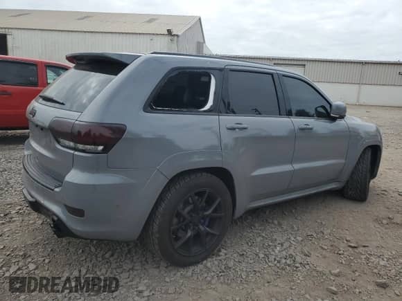 2017 Jeep Grand Cherokee SRT z VIN 1C4RJFDJ2HC939168, wystawiony jako Copart lot #81398425 z przebiegiem Nie podano mil oraz Szkoda całkowita • Salvage title. Historia ofert i sprzedaży dostępna na DreamBid. Obrazek 3.