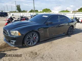 2014 Dodge Charger SRT-8 с VIN 2C3CDXEJ5EH205509, выставлен на аукционе Copart как лот 65216444 с пробегом 52 145 миль миль и Чистый • Clean title. История ставок и продаж доступна на DreamBid. Изображение 1.