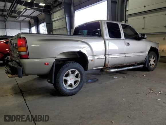 2002 GMC Sierra 1500 Denali z VIN 2GTFK69U021173036, wystawiony jako Copart lot #51416215 z przebiegiem 316 034 mil mil oraz Szkoda całkowita • Salvage title. Historia ofert i sprzedaży dostępna na DreamBid. Obrazek 3.