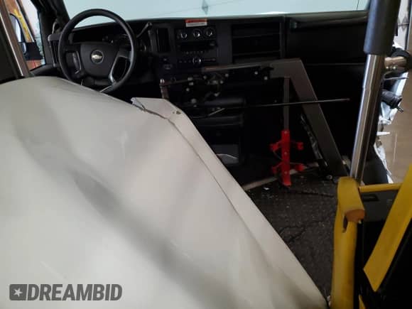 2009 Chevrolet Express Passenger с VIN 1GAHG39K491108724, выставлен на аукционе Copart как лот 57141425 с пробегом Не указан миль и Списание • Salvage title. История ставок и продаж доступна на DreamBid. Изображение 8.