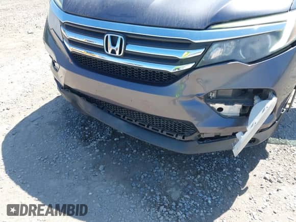 2018 Honda Pilot EX-L with VIN 5FNYF5H50JB006656, listed as a IAAI auction lot 43179982 with 130,515 mi miles and . Bid and sale history available at DreamBid. Image 6.