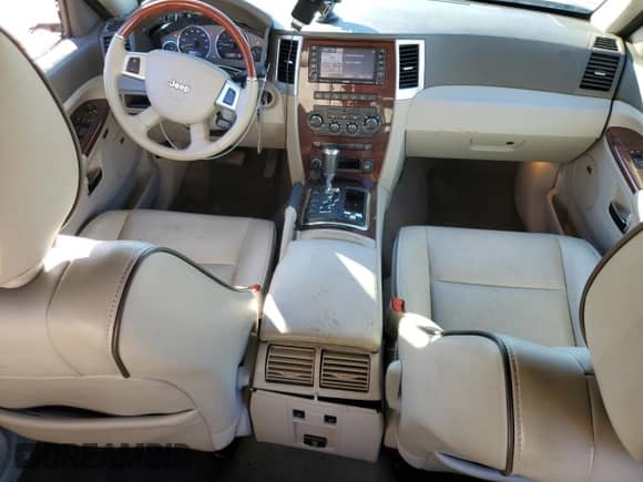 2009 Jeep Grand Cherokee with VIN 1J8HR68T19C550936, listed as a Copart auction lot 80090724 with 113,543 mi miles and Salvage title. Bid and sale history available at DreamBid. Image 8.