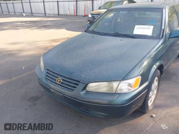 1997 Toyota Camry LE z VIN JT2BF22K1V0022364, wystawiony jako IAAI lot #42900943 z przebiegiem 283 129 mil mil oraz . Historia ofert i sprzedaży dostępna na DreamBid. Obrazek 6.