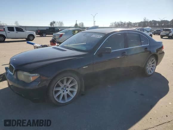 2003 BMW 7 Series 745i with VIN WBAGL63433DP63566, listed as a Copart auction lot 87365424 with 167,697 mi miles and Salvage title. Bid and sale history available at DreamBid. Image 1.