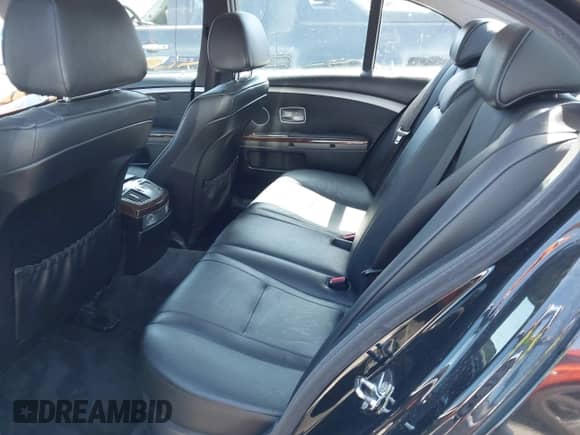 2006 BMW 7 Series 750i with VIN WBAHL83596DT05091, listed as a IAAI auction lot 41920423 with 154,651 mi miles and . Bid and sale history available at DreamBid. Image 8.